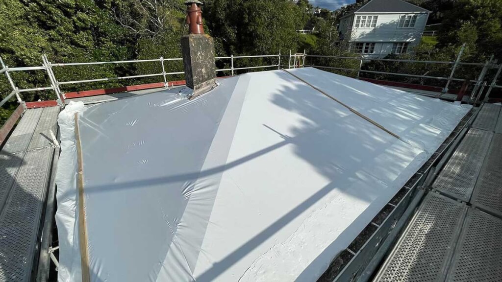 Shrink Wrapping Roofs versus Tarp Roofing - AMR Team November 2022 Blog post