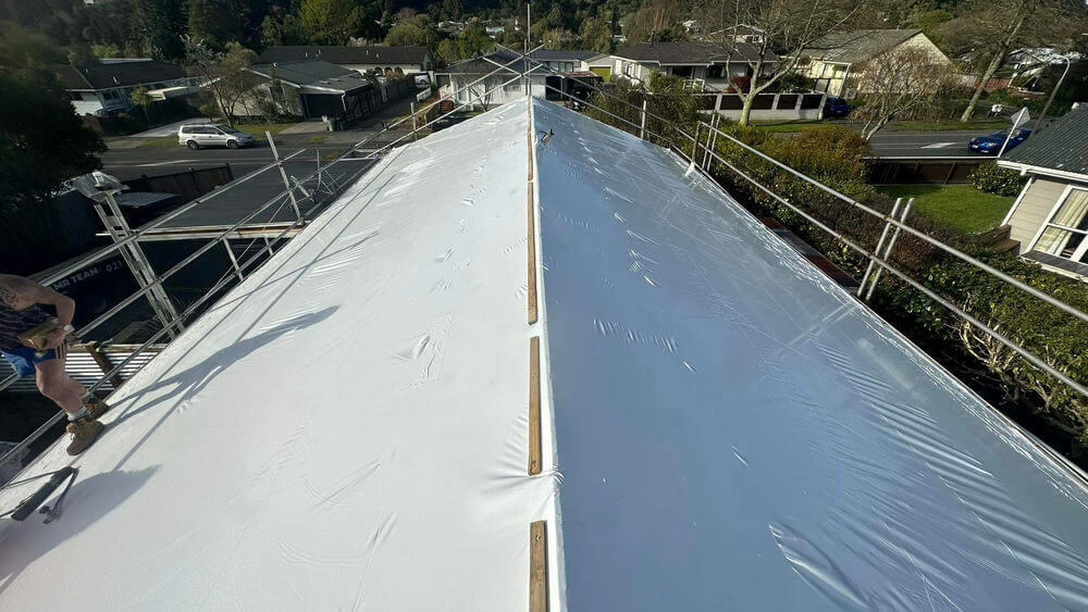 Shrink wrapping roofs for Asbestos Management and Removal